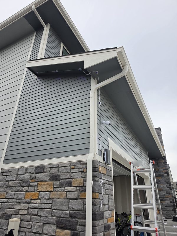 Flush-mount track detail under eave