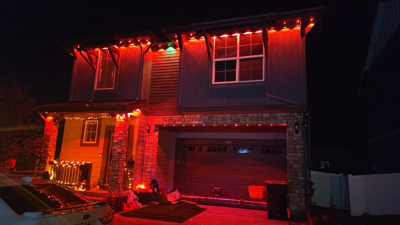 Halloween: deep red wash with amber porch string lights
